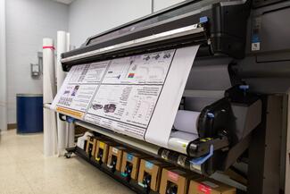 Printer running large format poster